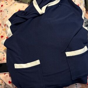 Navy Blue Top with White Trim the is a knit fashion with wide leg capri